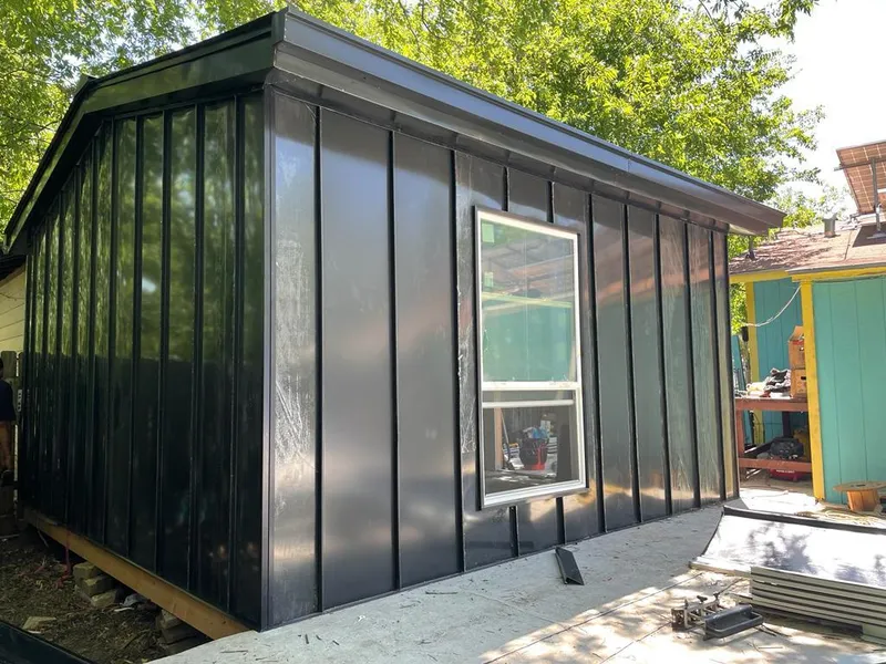 Black standing seam metal wall panels for Roof Inspection in Suitland